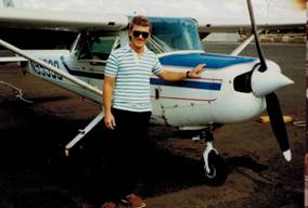 A small airplane sitting on the tarmac

Description automatically generated